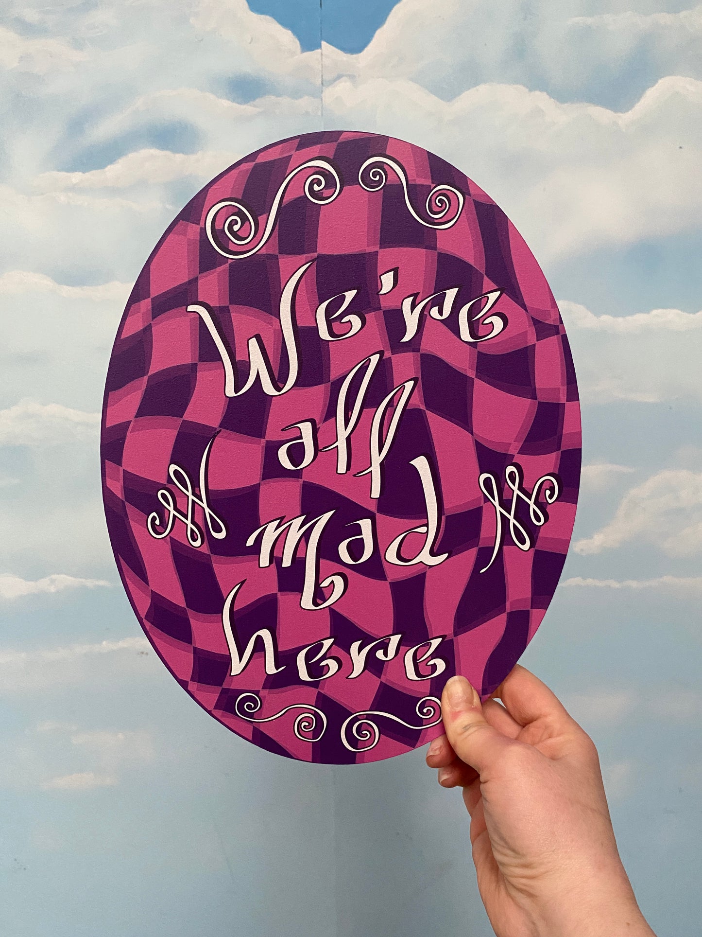 We're All Mad Here Sign