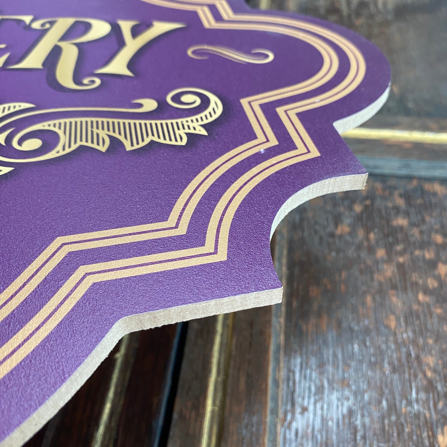 Purple Confectionery Shop Sign