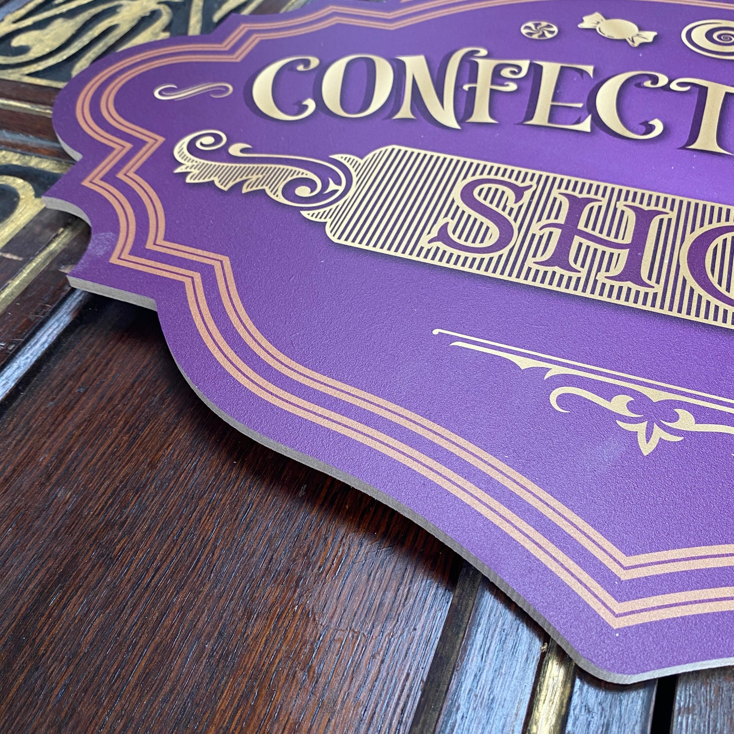 Purple Confectionery Shop Sign