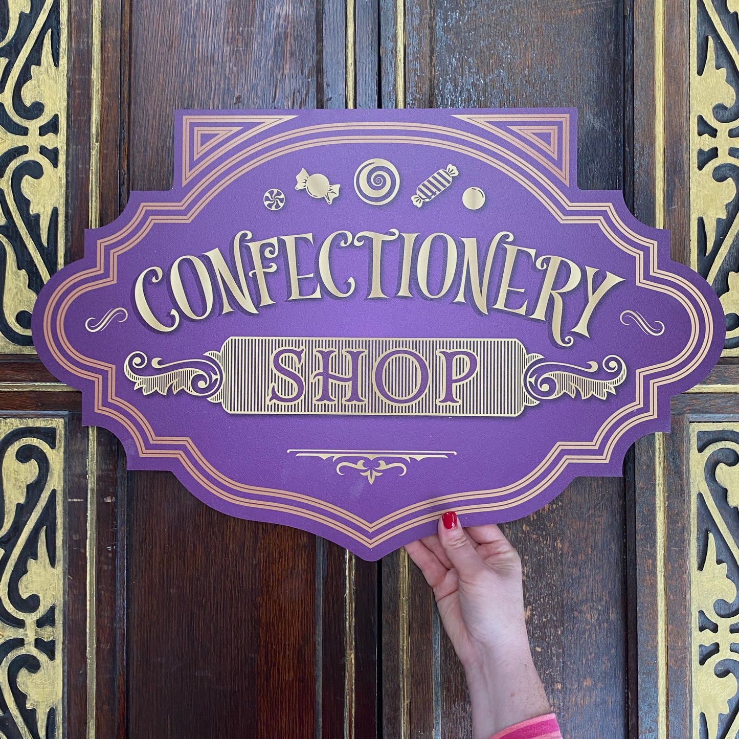 Purple Confectionery Shop Sign