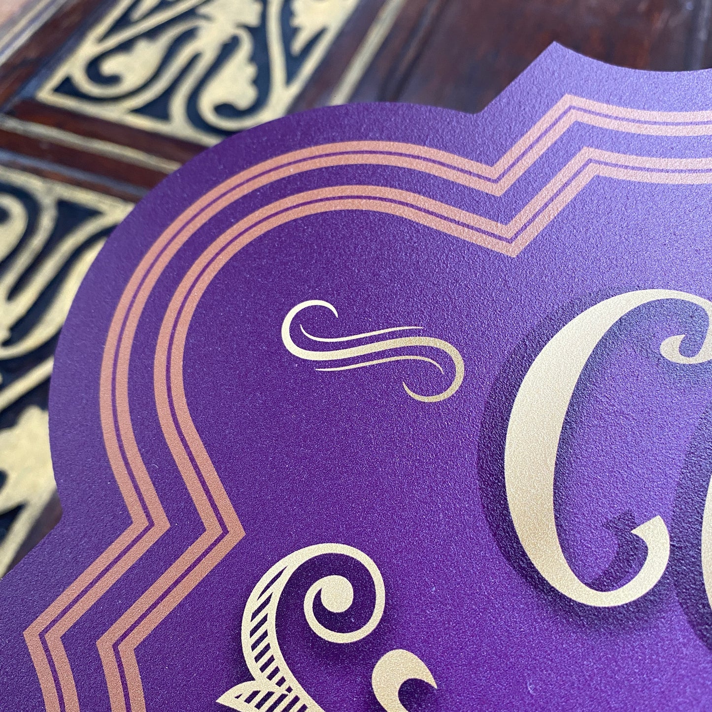 Purple Confectionery Shop Sign