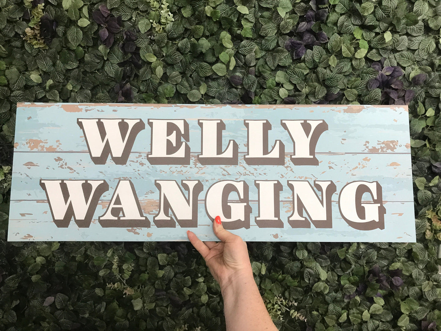 Welly Wanging Sign