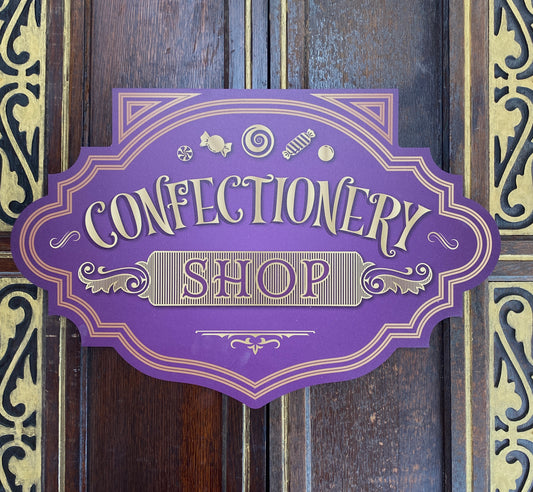 Purple Confectionery Shop Sign